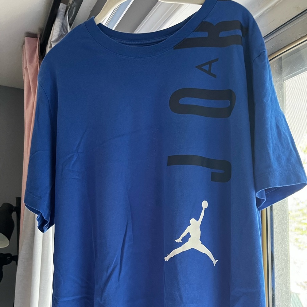 Blue Jordan logo wrap around tee